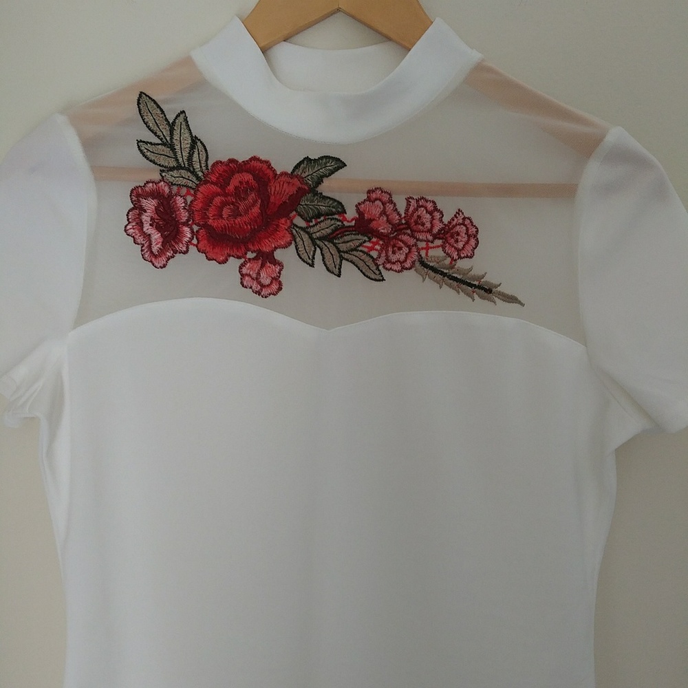 Floral Embroidered Crew neck blouse. Size M